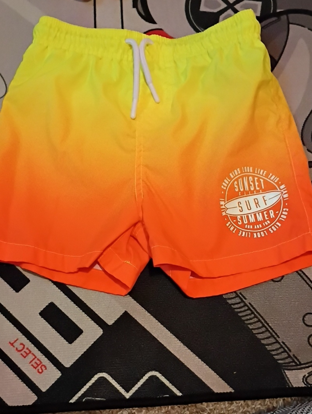 Kids Ombre Yellow to Orange Swim Trunks with Surf Emblem